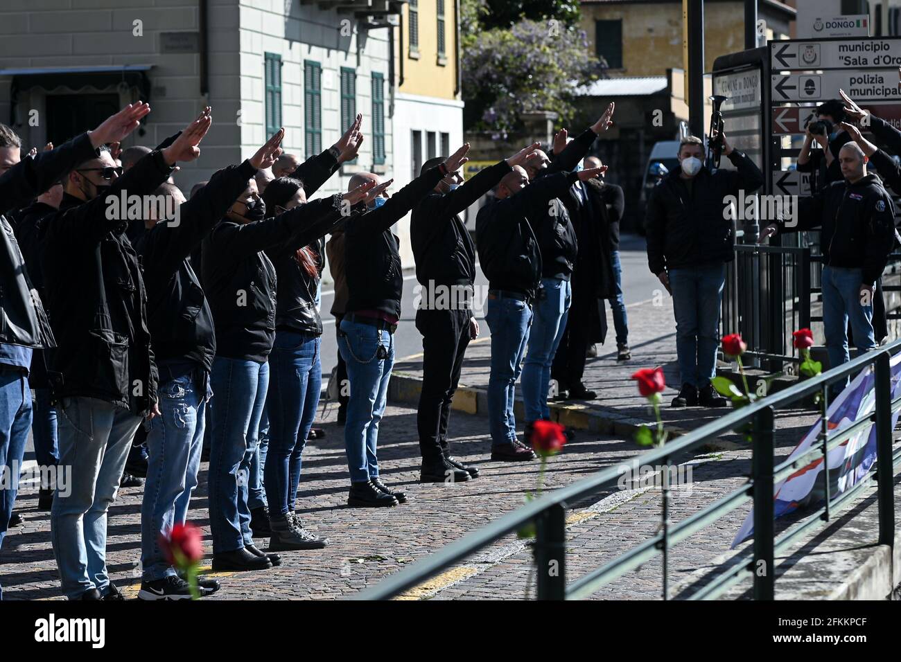 Dongo, Italy. 02nd May, 2021. Far right supporters make the roman salute to commemorate the death of Benito Mussolini and his mistress Claretta Petacci and other fascist leaders Dongo, Italy on 2 May 2021 Credit: Piero Cruciatti/Alamy Live News Stock Photo