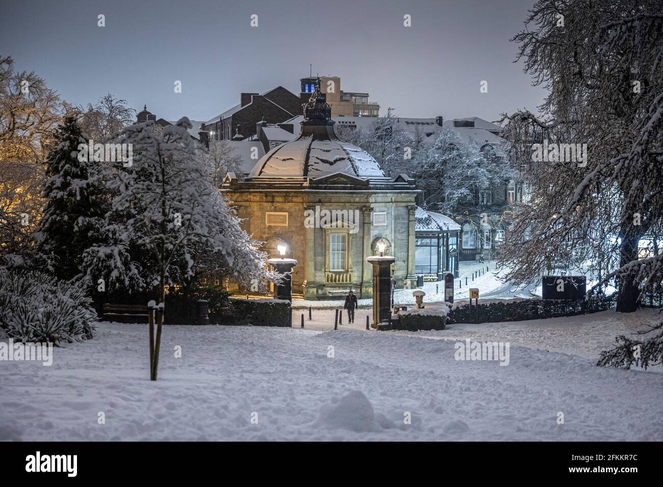 The Royal Pump Rooms, Harrogate on a snowy evening viewed from the Valley Gardens Stock Photo