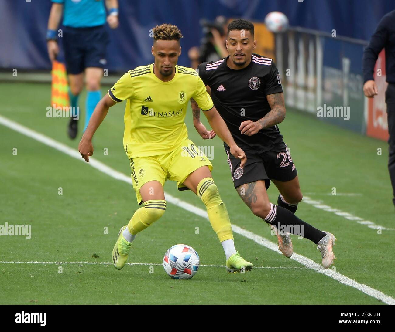 May 2, 2021: Nashville SC midfielder Hany Mukhtar (10) dribbles as Inter Miami CF midfielder Gregore (26) chases during the second half of an MLS game between the Inter Miami CF and the Nashville SC at Nissan Stadium in Nashville TN (Mandatory Photo Credit: Steve Roberts/CSM) Stock Photo