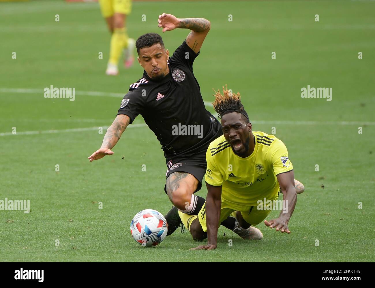 May 2, 2021: Inter Miami CF midfielder Gregore (26) takes down Nashville SC forward Charles Sapong (17) during the second half of an MLS game between the Inter Miami CF and the Nashville SC at Nissan Stadium in Nashville TN (Mandatory Photo Credit: Steve Roberts/CSM) Stock Photo