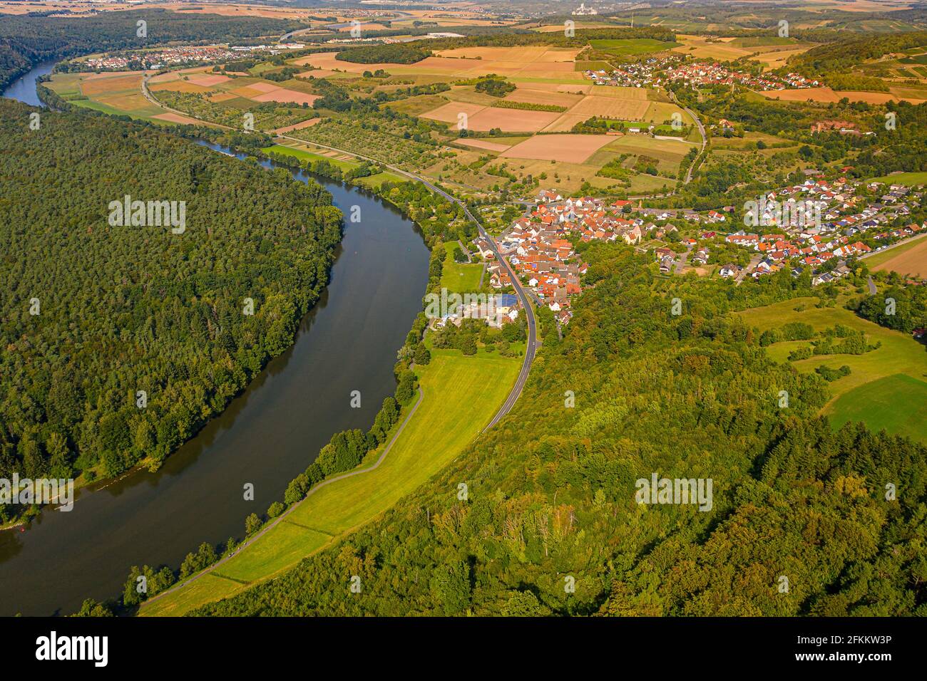 small German village by the river Stock Photo Alamy