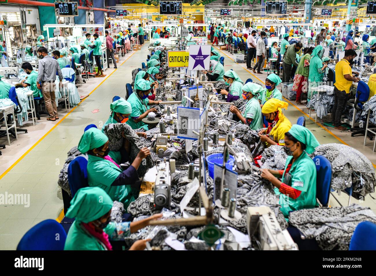 Dhaka, Bangladesh. 02nd May, 2021. Garment workers work in a sewing