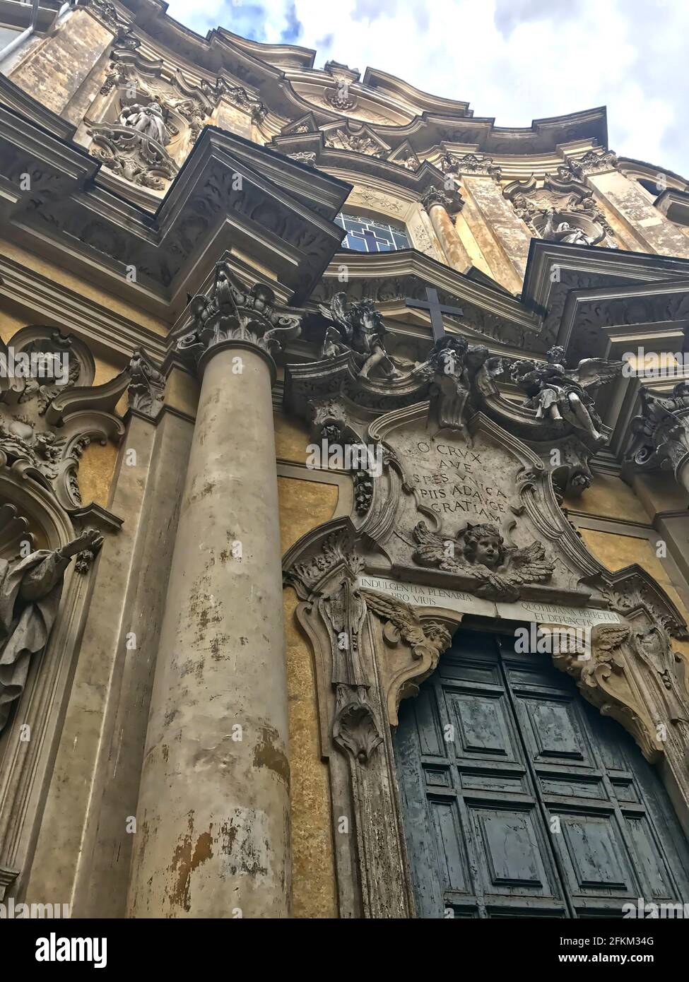 A low angle view of the facade of Santa Maria Maddalena, a Roman ...