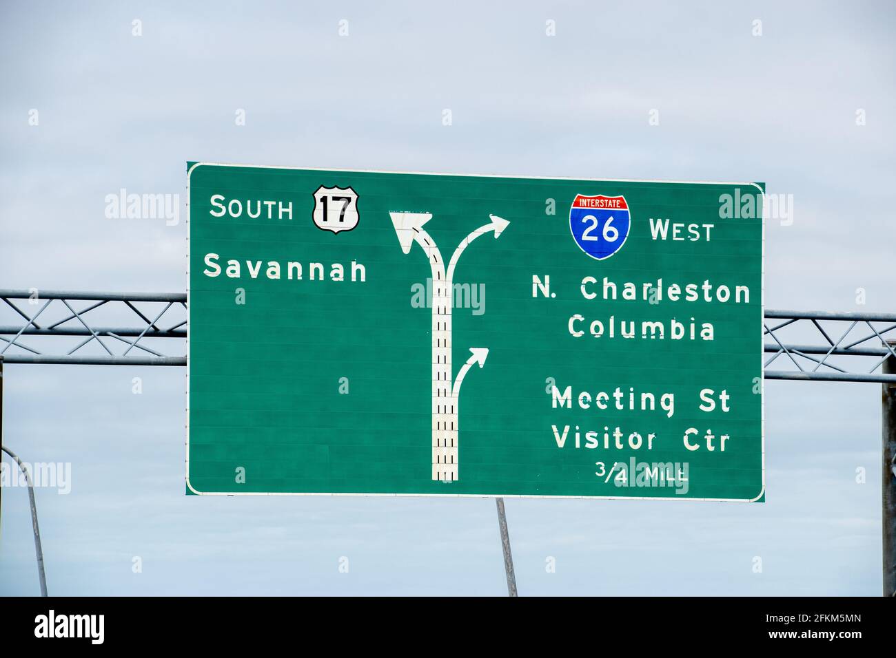 An overhead highway sign on the Ravenel bridge with directions to
