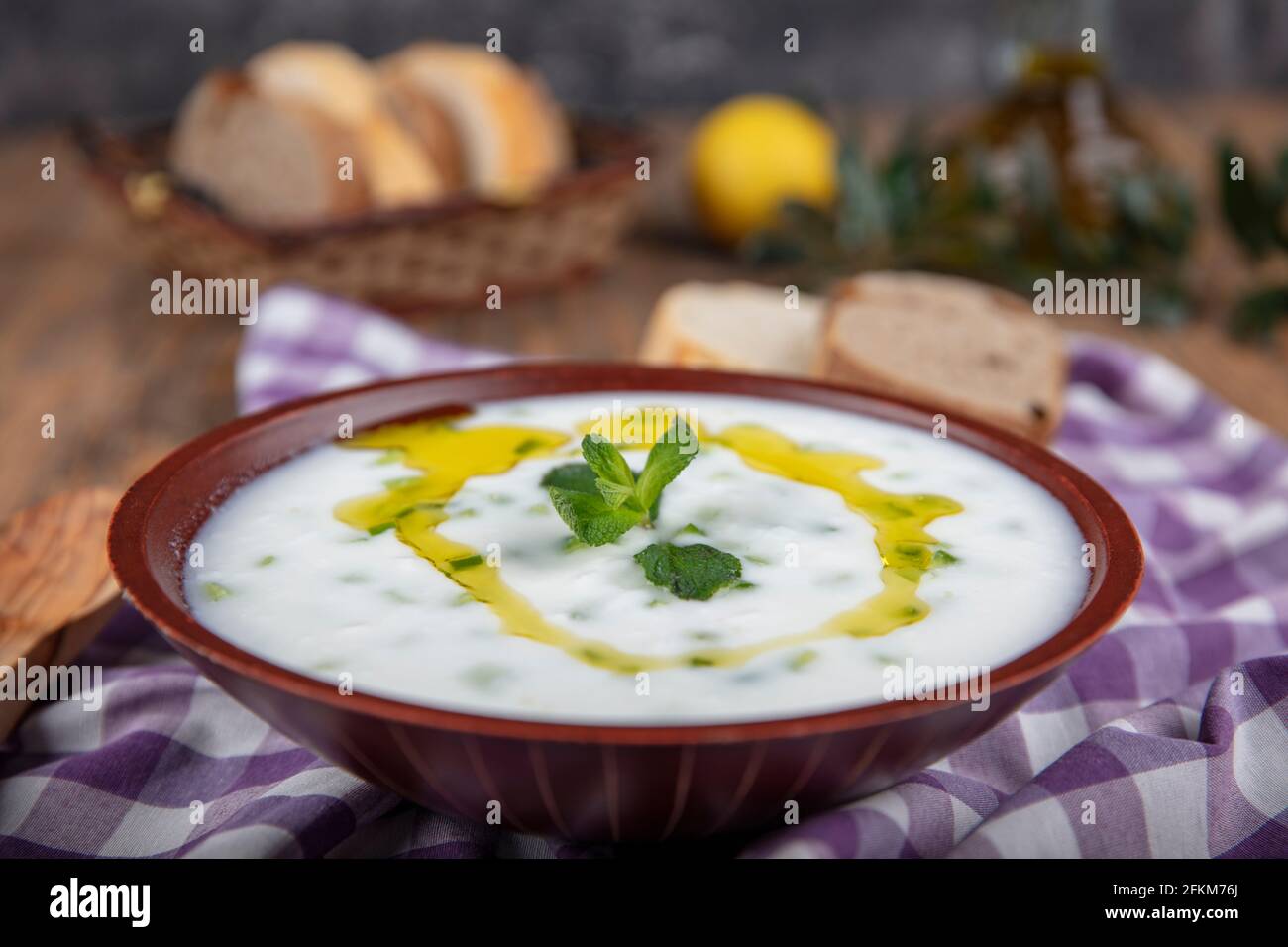Cacik (traditional Turkish yogurt tapas). Traditional Turkish drink cacik or tzatziki . made from yogurt and cucumbers. Stock Photo