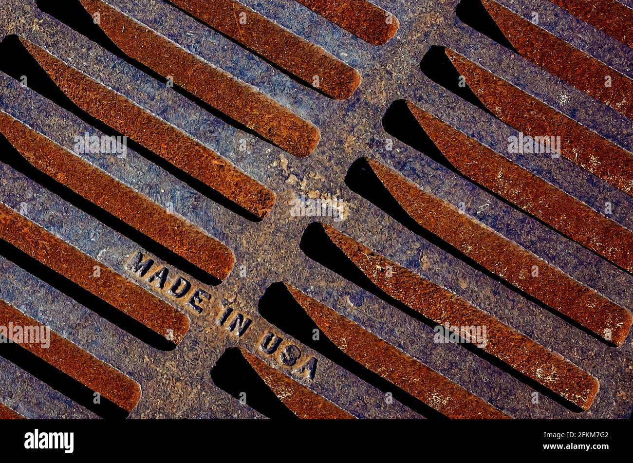 An iron grate constructed by East Jordan Iron Works is pictured downtown, April 25, 2021, in Moss Point, Mississippi. Stock Photo