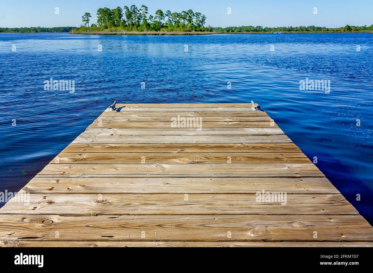 A pier overlooks the Escatawpa River at the Riverfront Park boat launch