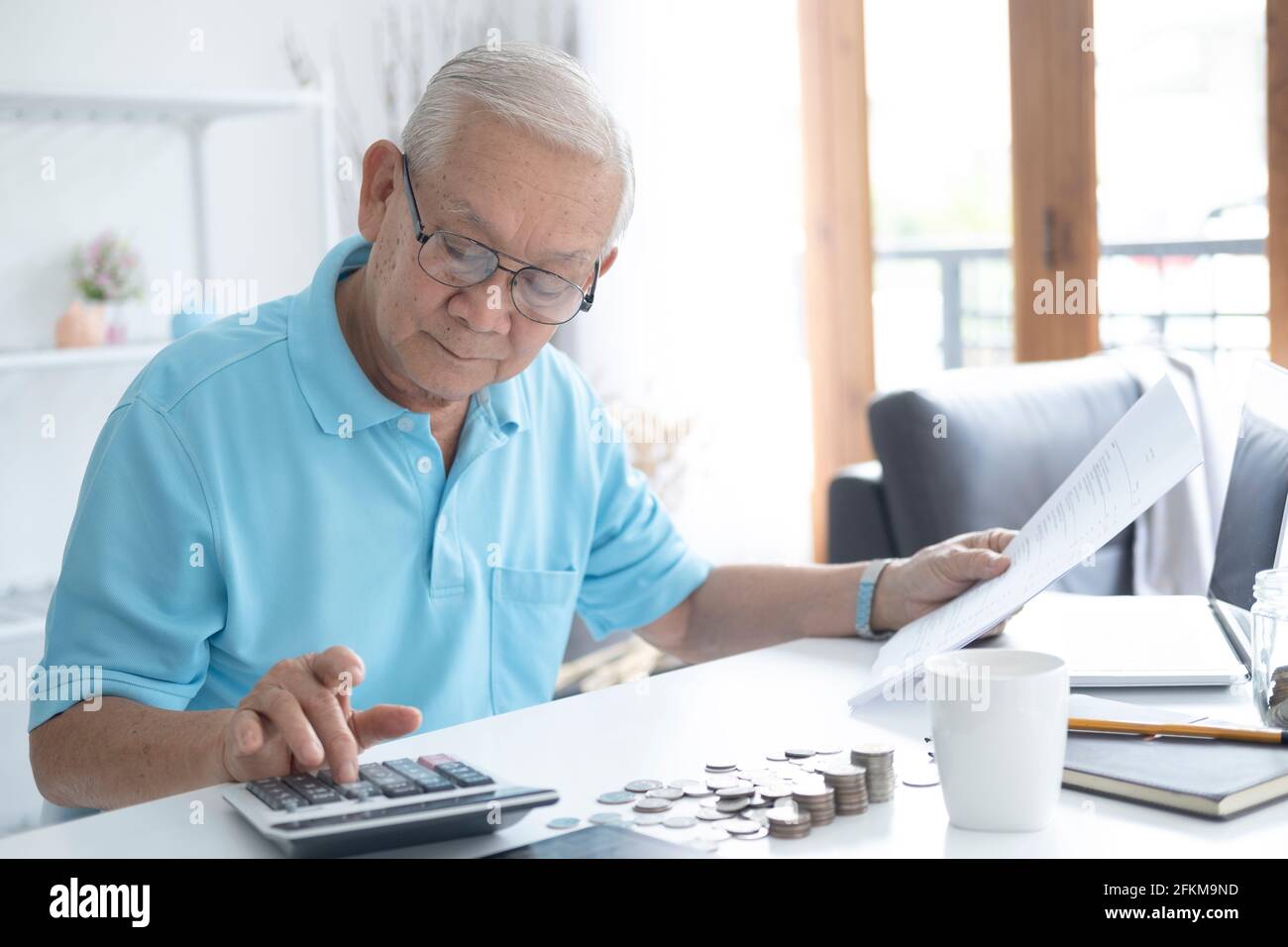 Accountant calculating taxes in hi-res stock photography and images - Alamy