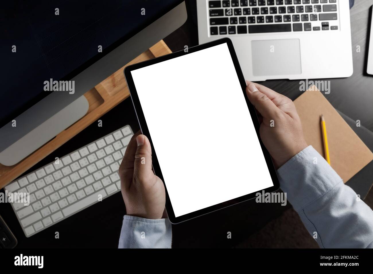 hands holding digital Mock up tablet touch screen device isolated ...