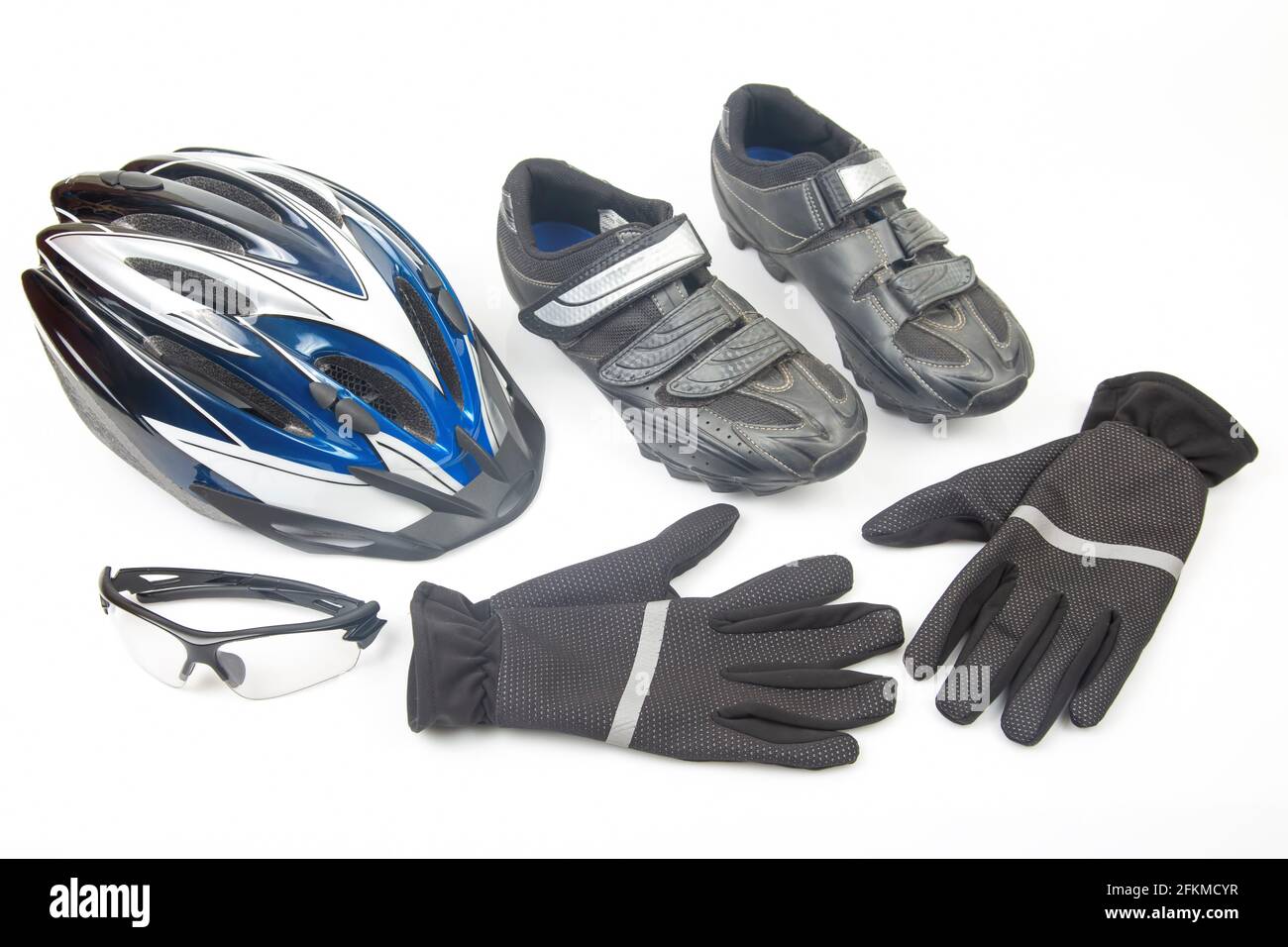 bicycle helmet, glasses, gloves and cycling shoes on a white background  Stock Photo - Alamy