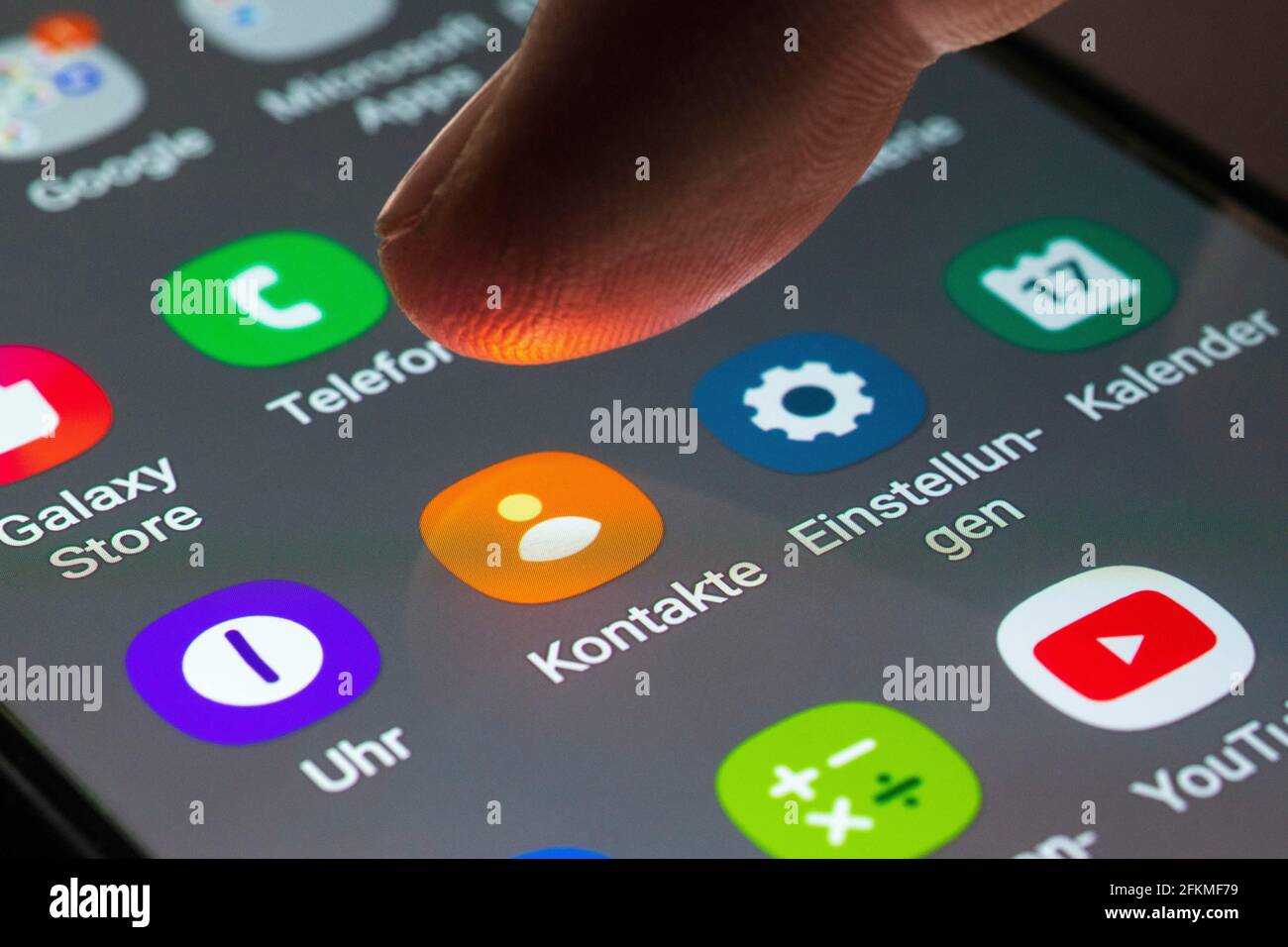 Contacts, settings, clock, calendar, logo, app icon, display on a mobile screen, smartphone Stock Photo