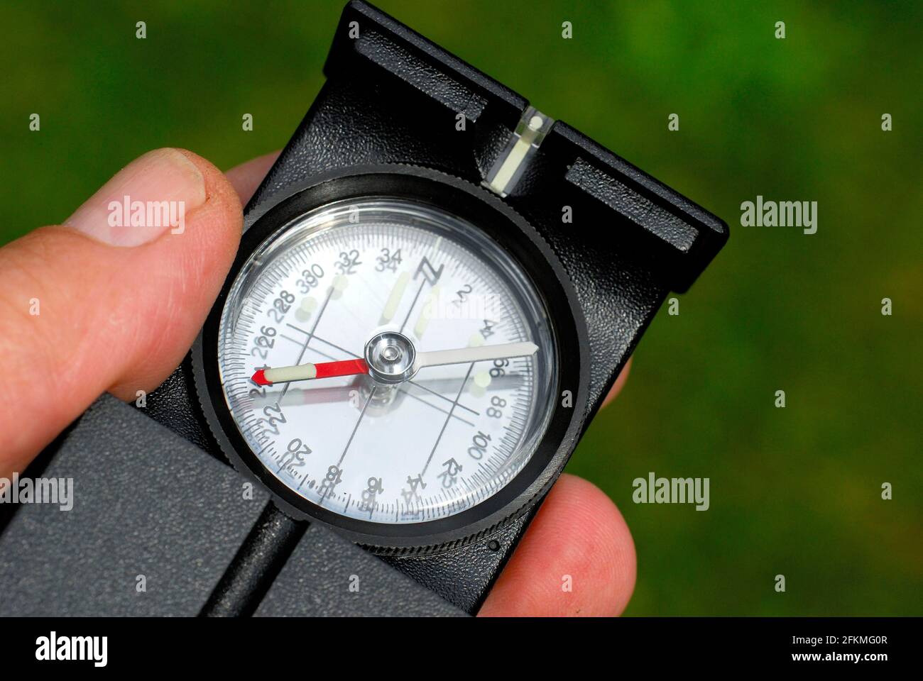 Compass in hand, orientation Stock Photo Alamy