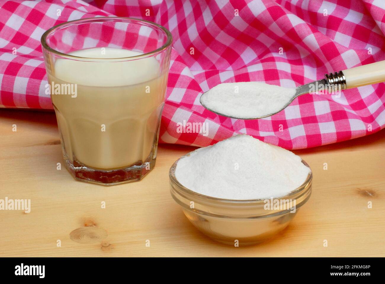 Glass of milk and bowl with lactose, lactose, sugar Stock Photo Alamy