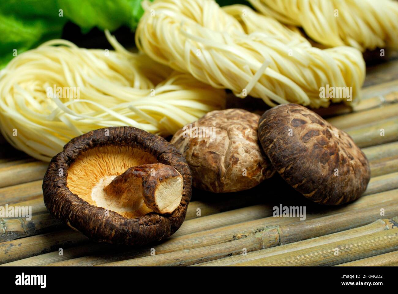 Shitake mushrooms, dried, and Asian noodles, Shiitake (Lentinus edodes) Shitake Stock Photo