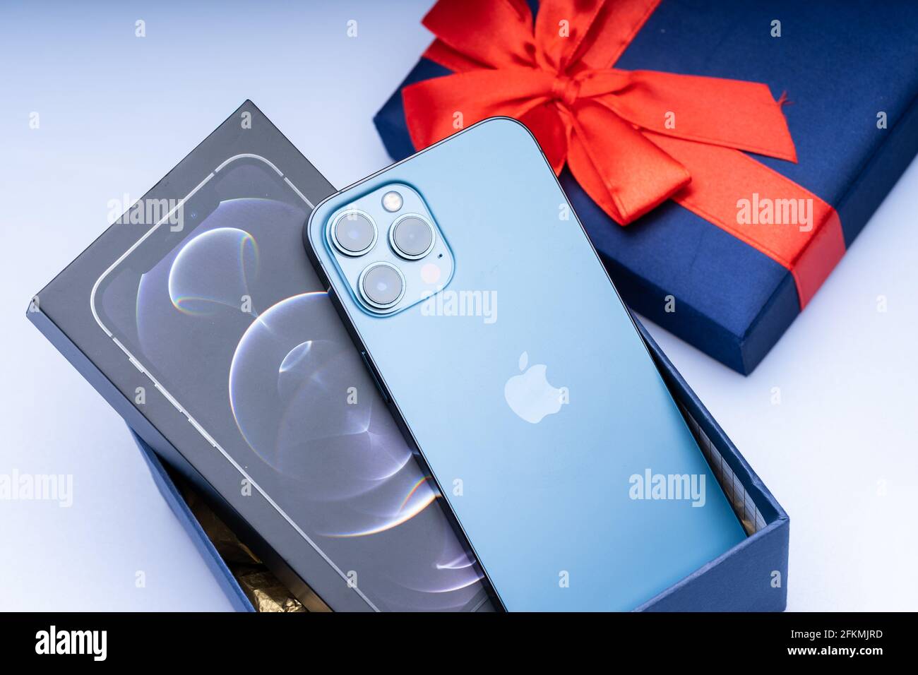 The new iphone 12 pro max, pacific blue colour Stock Photo Alamy