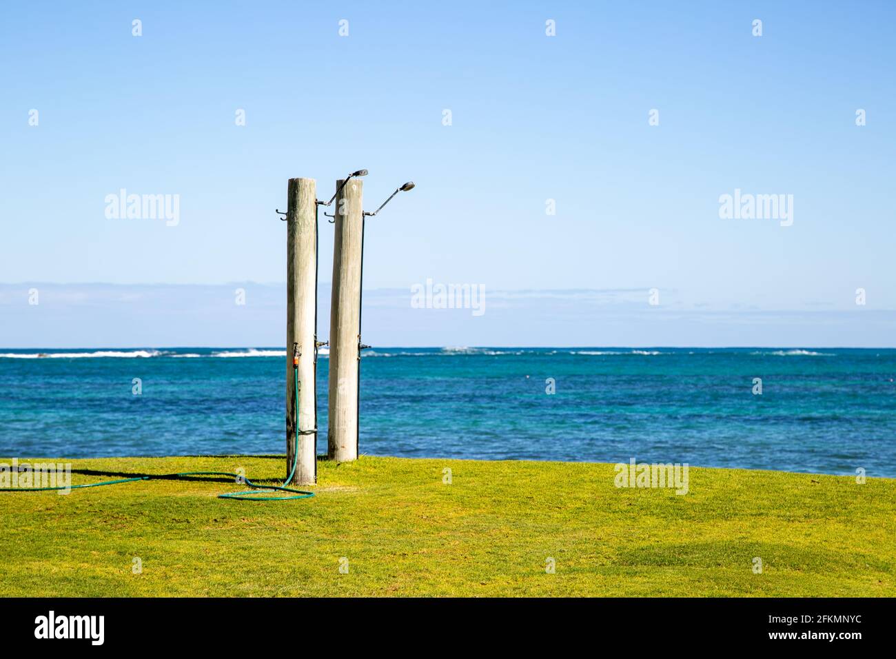 Public outdoor showers by the beach Stock Photo
