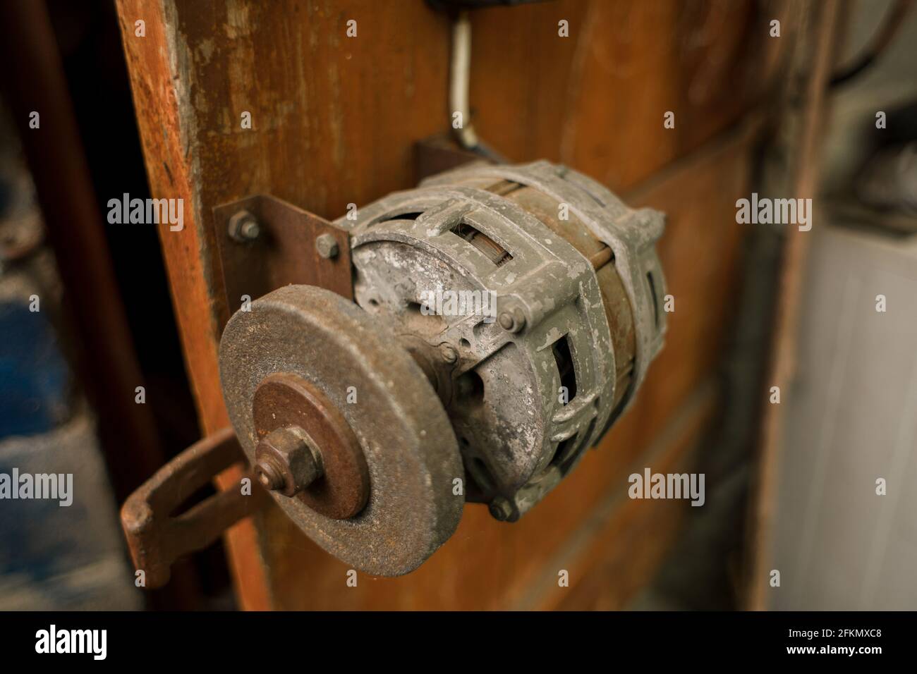 an electric knife sharpening tool in the workshop Stock Photo