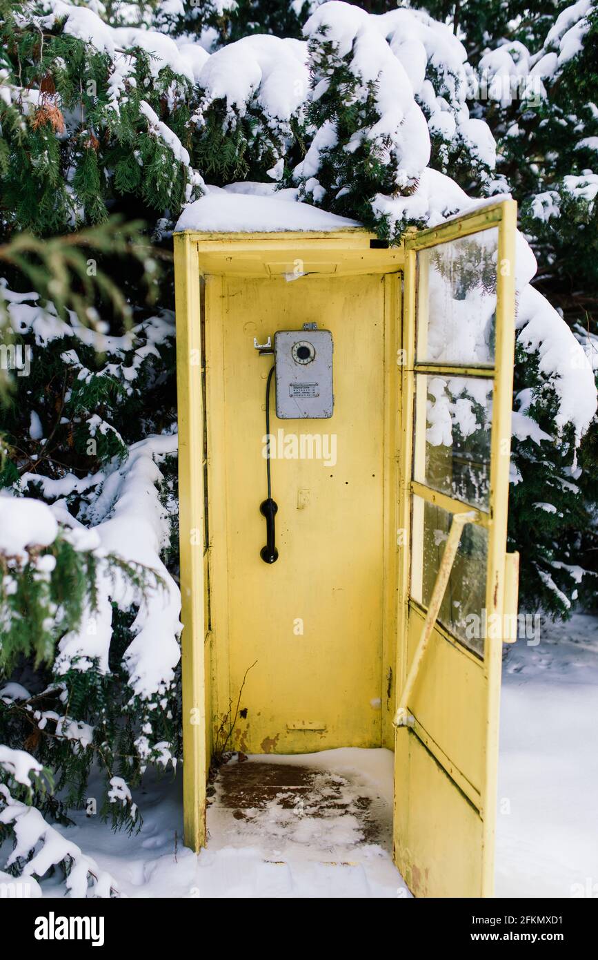Vintage callbox, yellow telephone booth, retro payphone Stock Photo