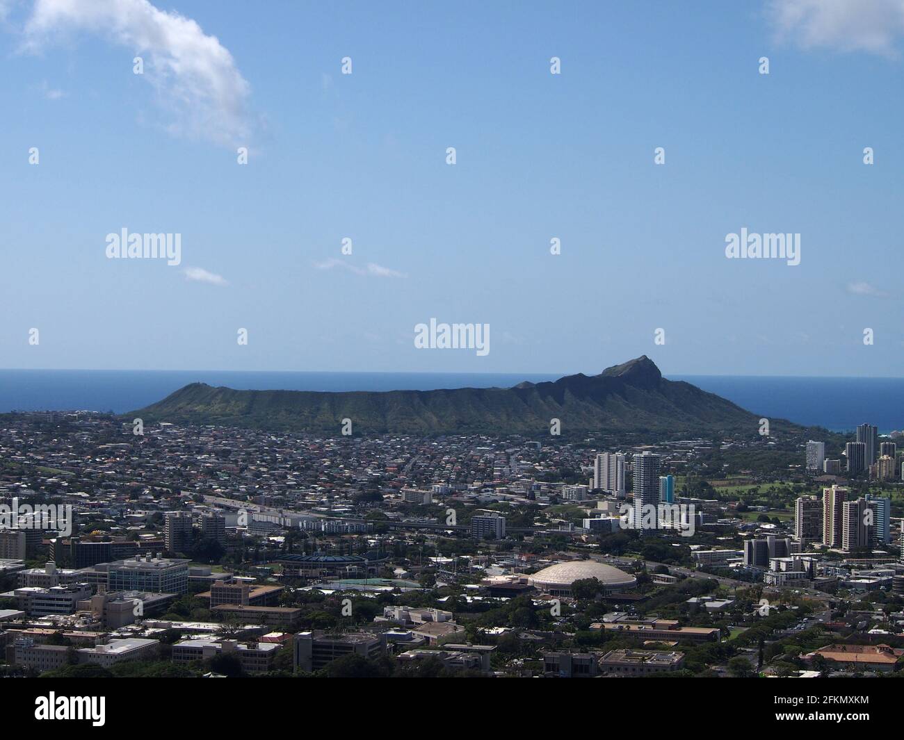 The city of Honolulu from Diamond head to Manoa with Kaimuki, Kahala, and oceanscape visible on Oahu on a nice day from high in the mountains.  Seen f Stock Photo