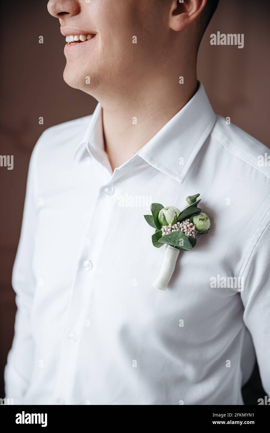 The decorative detail on the shirt of the groom. Wedding design groom's boutonniere Stock Photo - Alamy The decorative detail on the shirt of the groom. Wedding design groom's boutonniere Stock Photo - Alamy