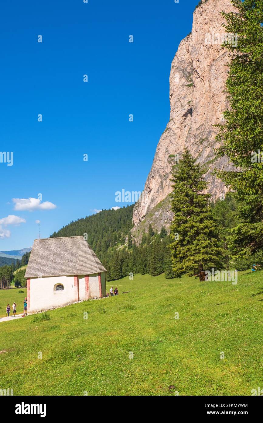 Small chapel on an alp meadow at a rock wall in Langental in Italy Stock Photo