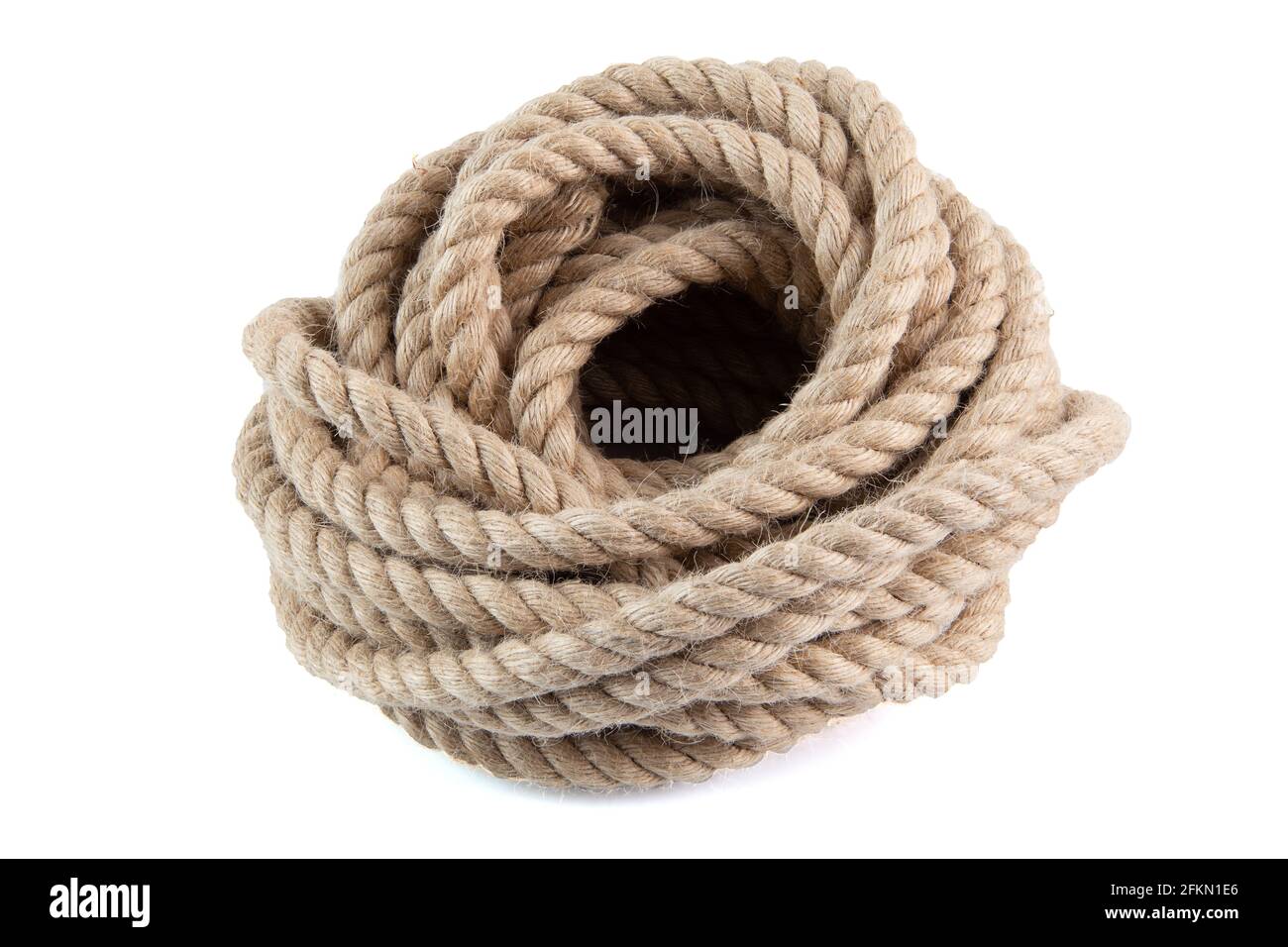 coil of natural 10 mm Jute Hessian Rope Cord Braided Twisted isolated on white background. Stock Photo