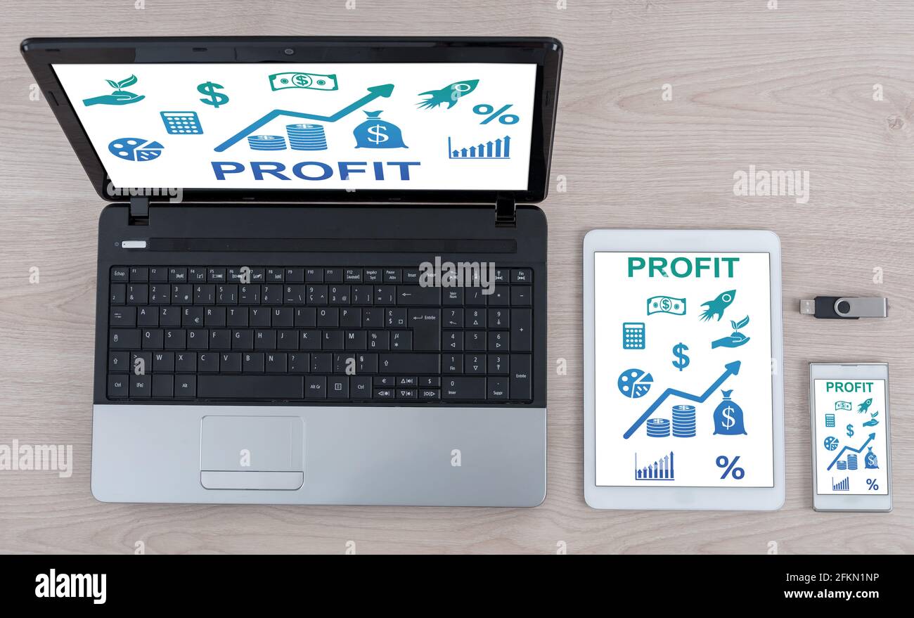 Profit concept shown on different information technology devices Stock Photo