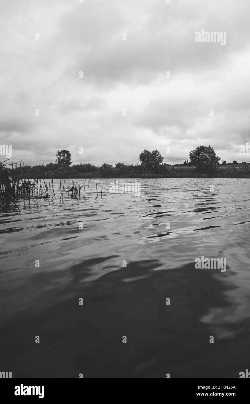 Black and white landscape with lake Stock Photo