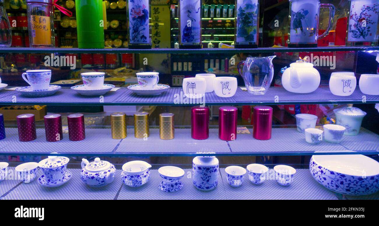 Chinese teapots and cups in a shop window , Hong Kong, China. Stock Photo