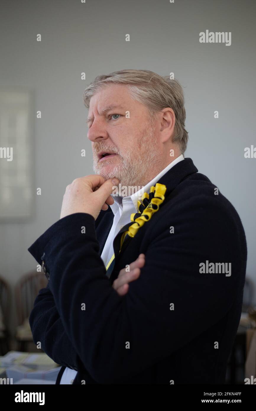 Angus Robertson of the Scottish National Party prepares his campaign leaflets before undertaking canvassing in Edinburgh Central constituency, ahead of the May 6th Scottish parliamentary elections, in Edinburgh, Scotland, on 14 April 2021. Stock Photo