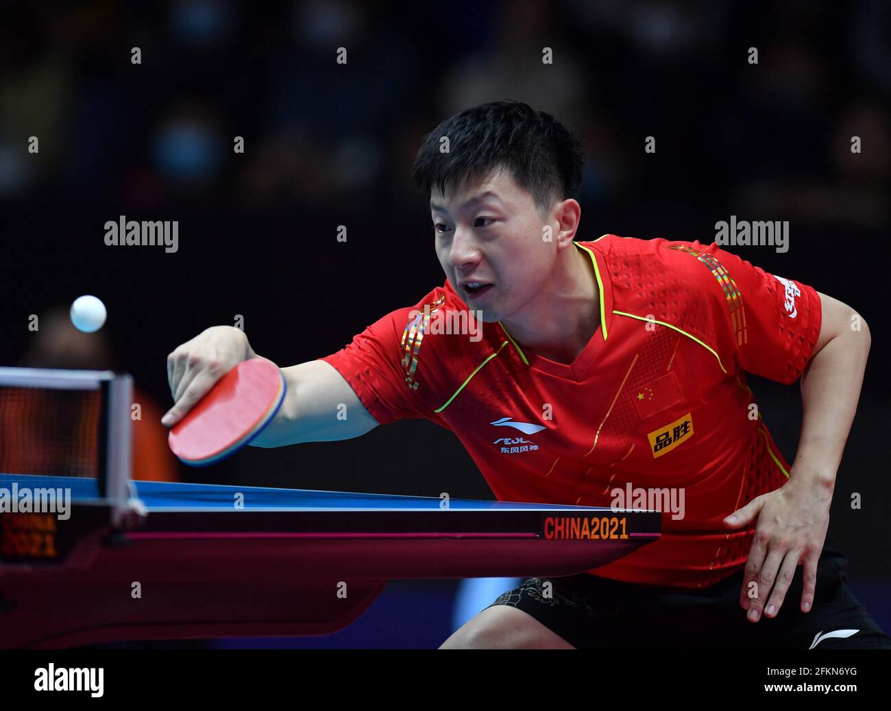 Xinxiang, China's Henan Province. 3rd May, 2021. Ma Long hits a return  during the men's singles first round match against Xue Fei at the 2021 WTT  (World Table Tennis) Grand Smashes Trials