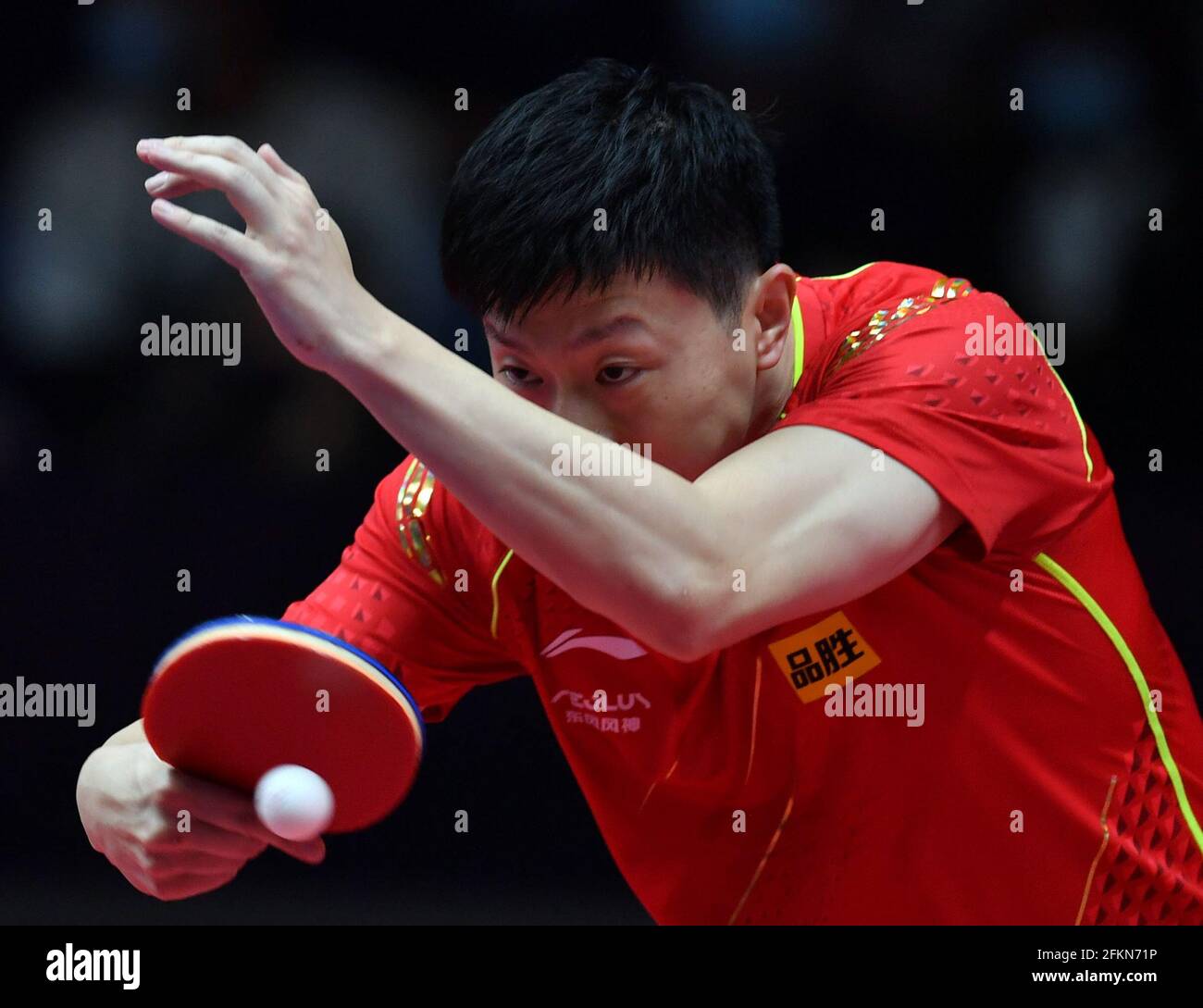Xinxiang, China's Henan Province. 3rd May, 2021. Ma Long hits a return  during the men's singles first round match against Xue Fei at the 2021 WTT  (World Table Tennis) Grand Smashes Trials