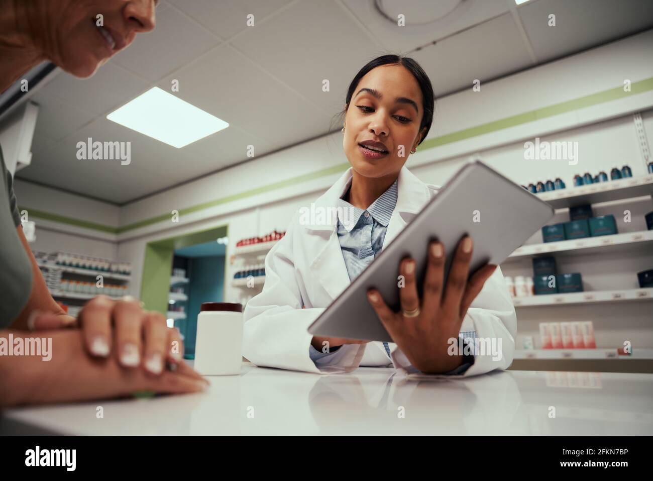 Pharmacist counter hi-res stock photography and images - Alamy