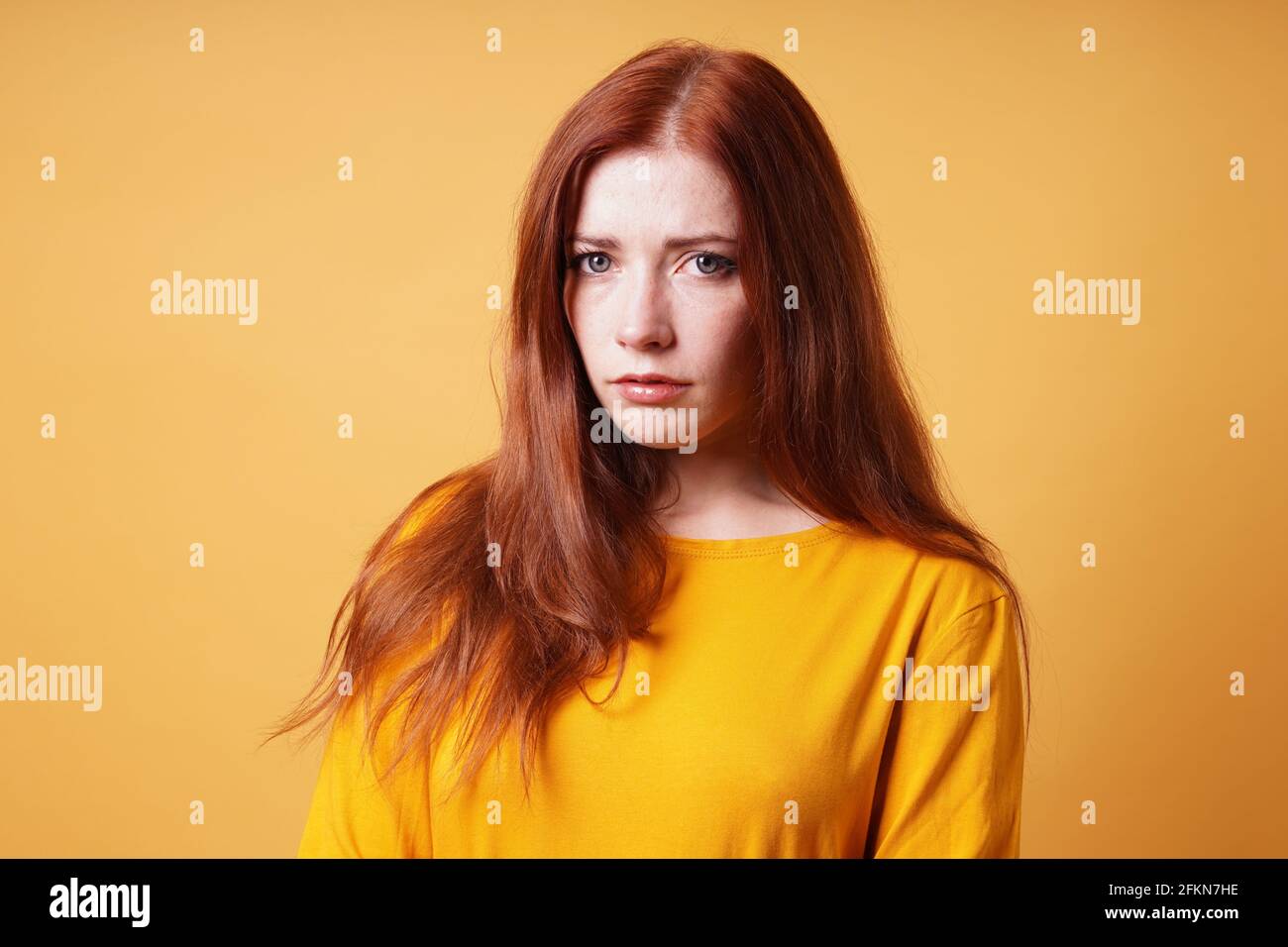 sad young woman looking worried and depressed Stock Photo
