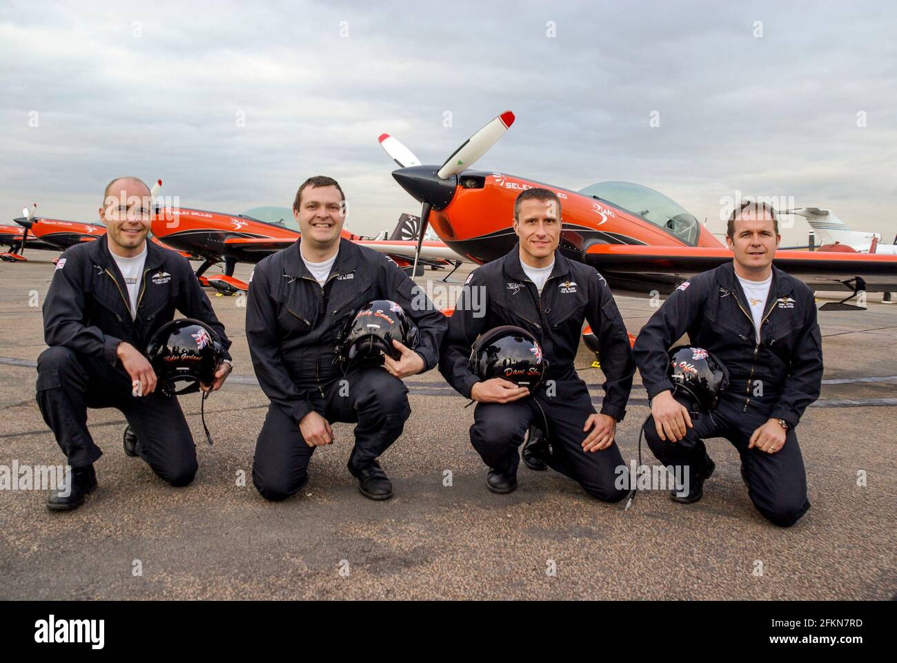 The Blades pilots Myles Garland, Andy Evans, Dave Slow and Andy Offer. Former Red Arrows pilots, promoting the Southend Airshow at Southend Airport Stock Photo