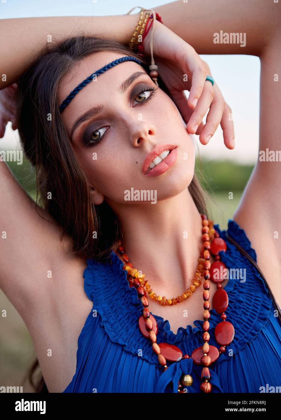 Close-up outdoor portrait of the beautiful young boho (hippie) girl Stock Photo