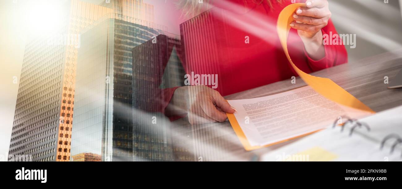 Businesswoman opening folder with paper documents; multiple exposure ...