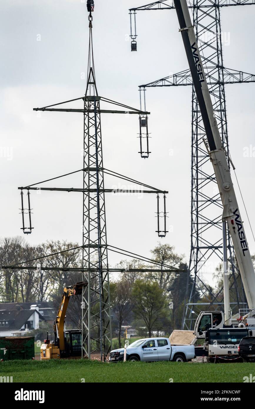 Dismantling, demolition of a high-voltage pylon, the smaller pylon makes way for a larger one belonging to an extra-high voltage line route, near Dorm Stock Photo