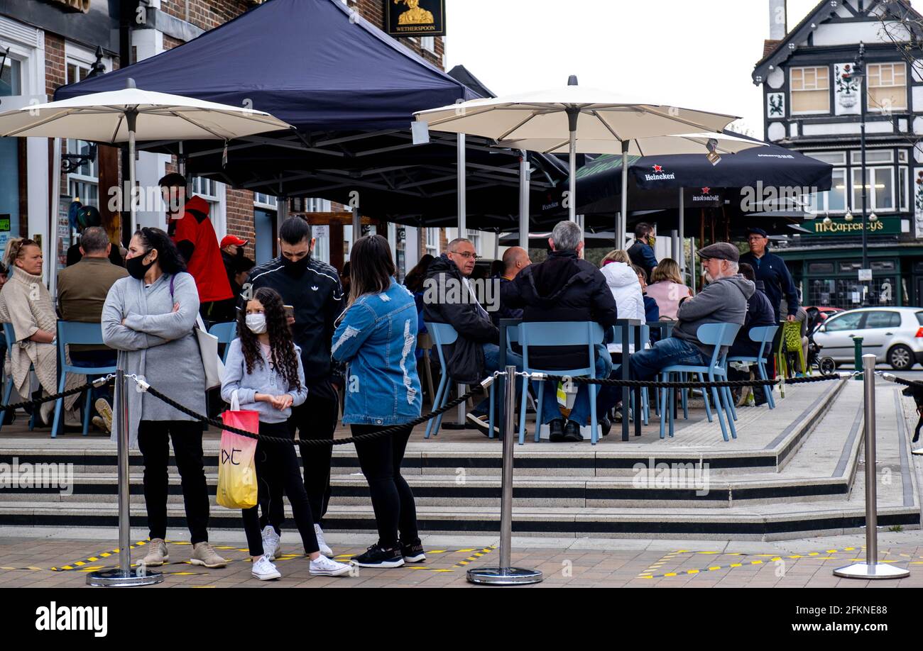 Epsom Surrey London UK, May 02 2021, Crowds of People Drinking Outside A Wetherspoons pub Sitting On The Terrace Stock Photo