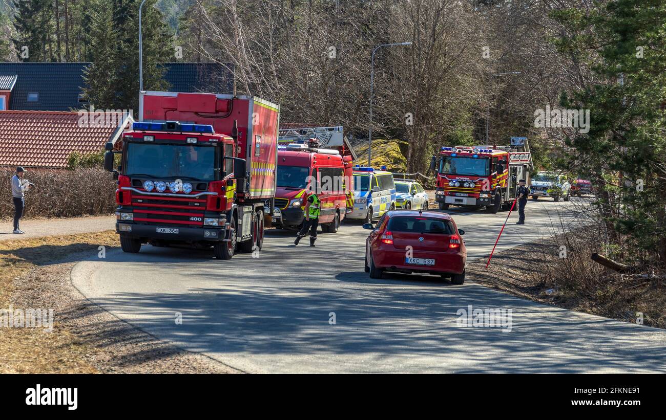 Floda, Sweden. March 17 2021: Fire department and Police respond to a reported house fire Stock Photo