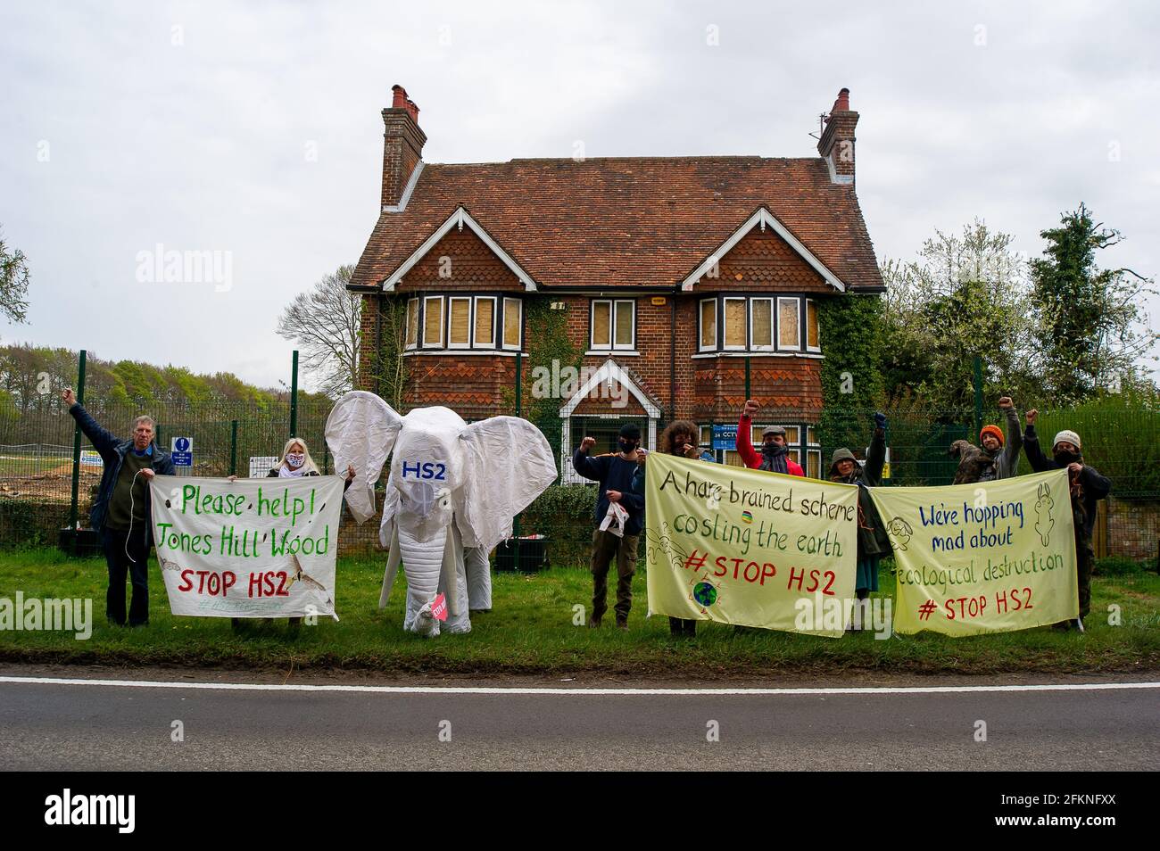Wendover, Buckinghamshire, UK. 29th April, 2021. Stop HS2 activists were outside Road Barn Farm in Wendover today with a life size white elephant. Locals are furious that HS2 have destroyed a huge area of woodland on the farm in preparation for building a bentonite factory. The farmhouse and barns are to be demolished by HS2 too. The costs of the High Speed 2 HS2 railway from London to Birmingham are spiralling out of control. HS2 puts 108 ancient woodlands, 33 SSSIs and 693 wildlife sites at risk. Credit: Maureen McLean/Alamy Stock Photo