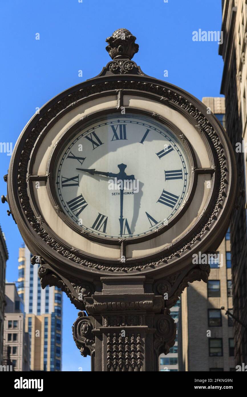 Seth Thomas sidewalk clock,  Fifth Avenue & West 44th Street, Manhattan, New York City, USA Stock Photo