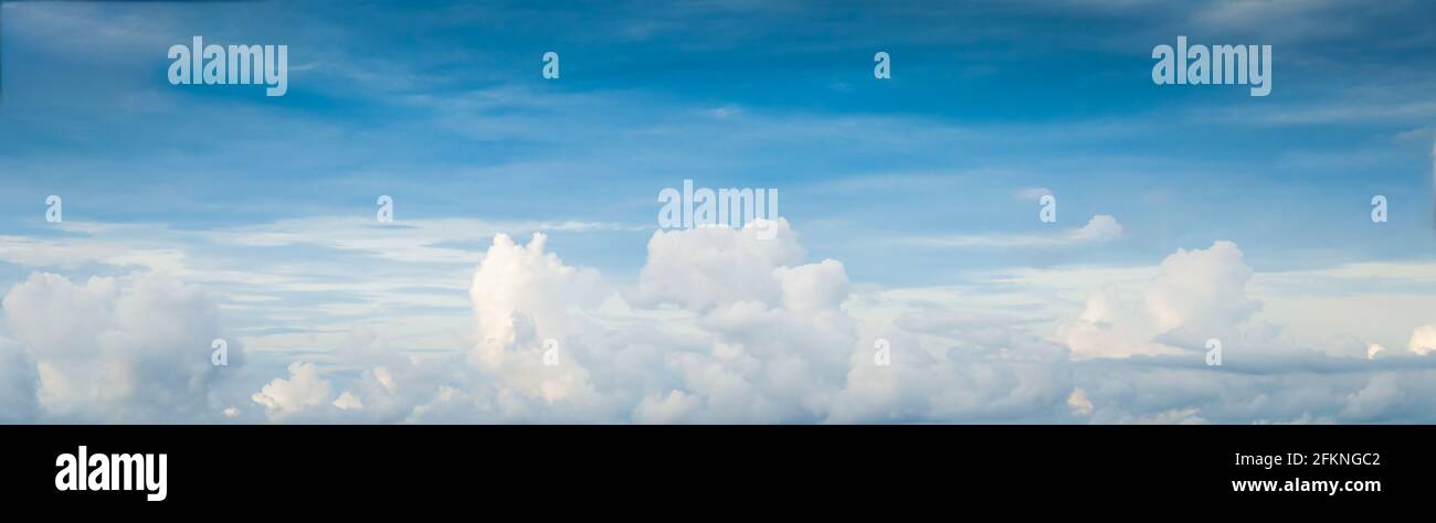 Beautiful blue sky with white fluffy clouds Stock Photo - Alamy