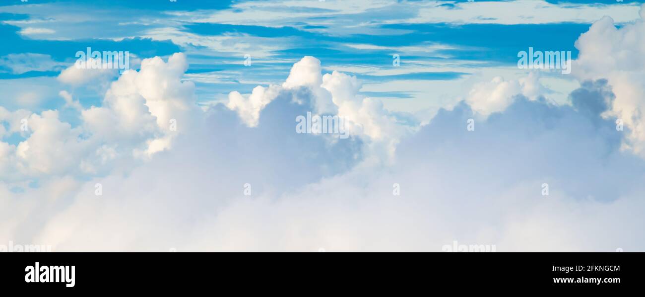 Beautiful blue sky with white fluffy clouds Stock Photo - Alamy