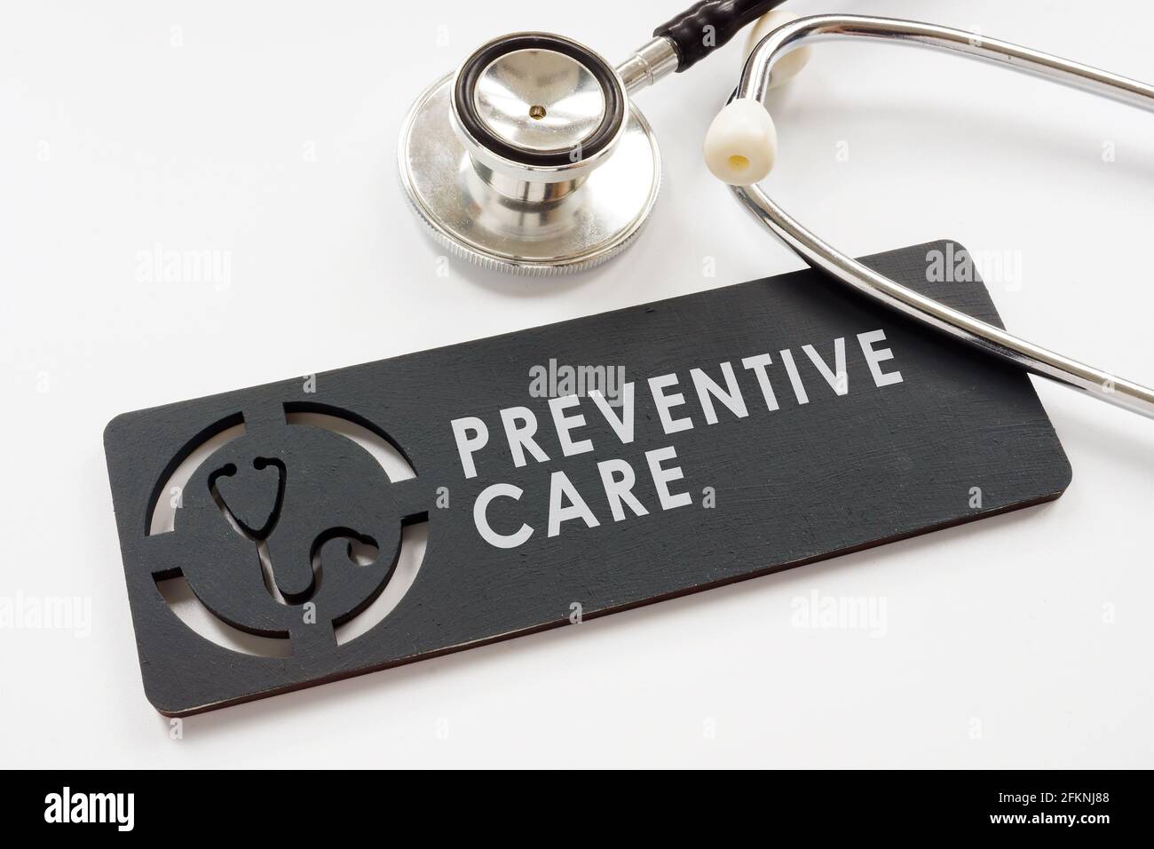 Medical preventive care and services for health plate and stethoscope. Stock Photo