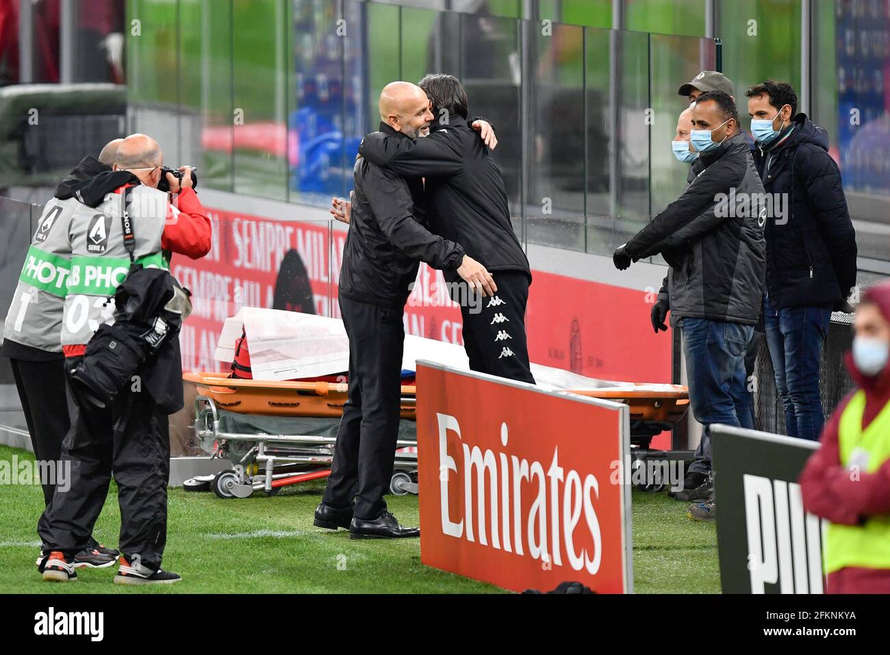 Milano, Italy. 01st, May 2021. Head coach Stefano Pioli of AC Milan greets head coach Filippo Inzaghi of Benevento before the Serie A match between AC Milan and Benevento at San Siro in Milano. (Photo credit: Gonzales Photo - Tommaso Fimiano). Stock Photo