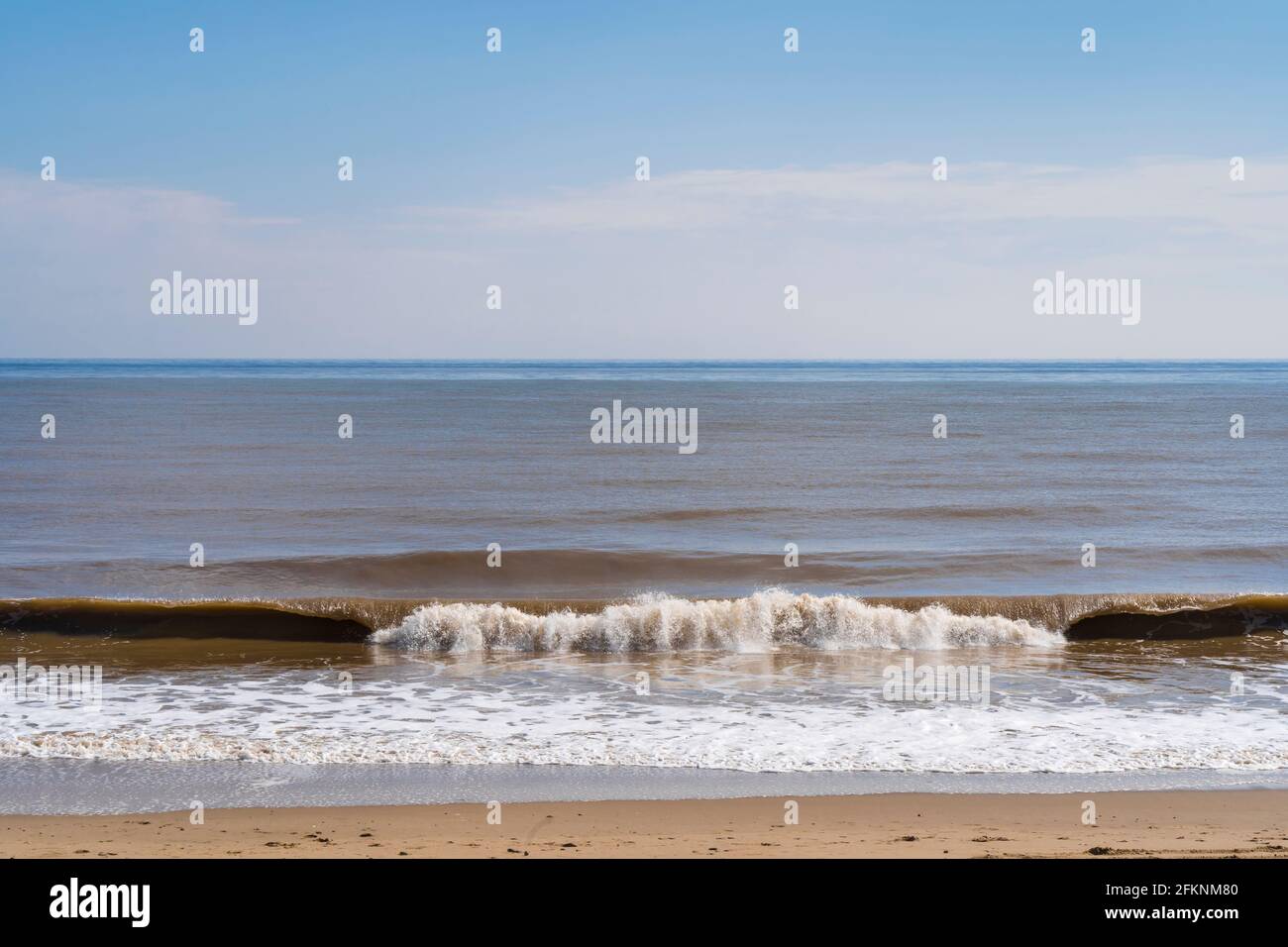 Waves breaking on beech Mablethorpe Lincolnshire Stock Photo
