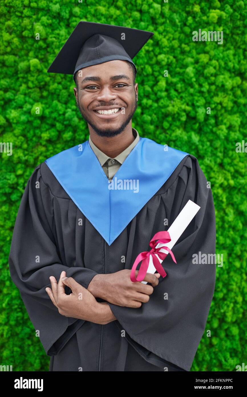 Graduate gown standing hi-res stock photography and images - Alamy