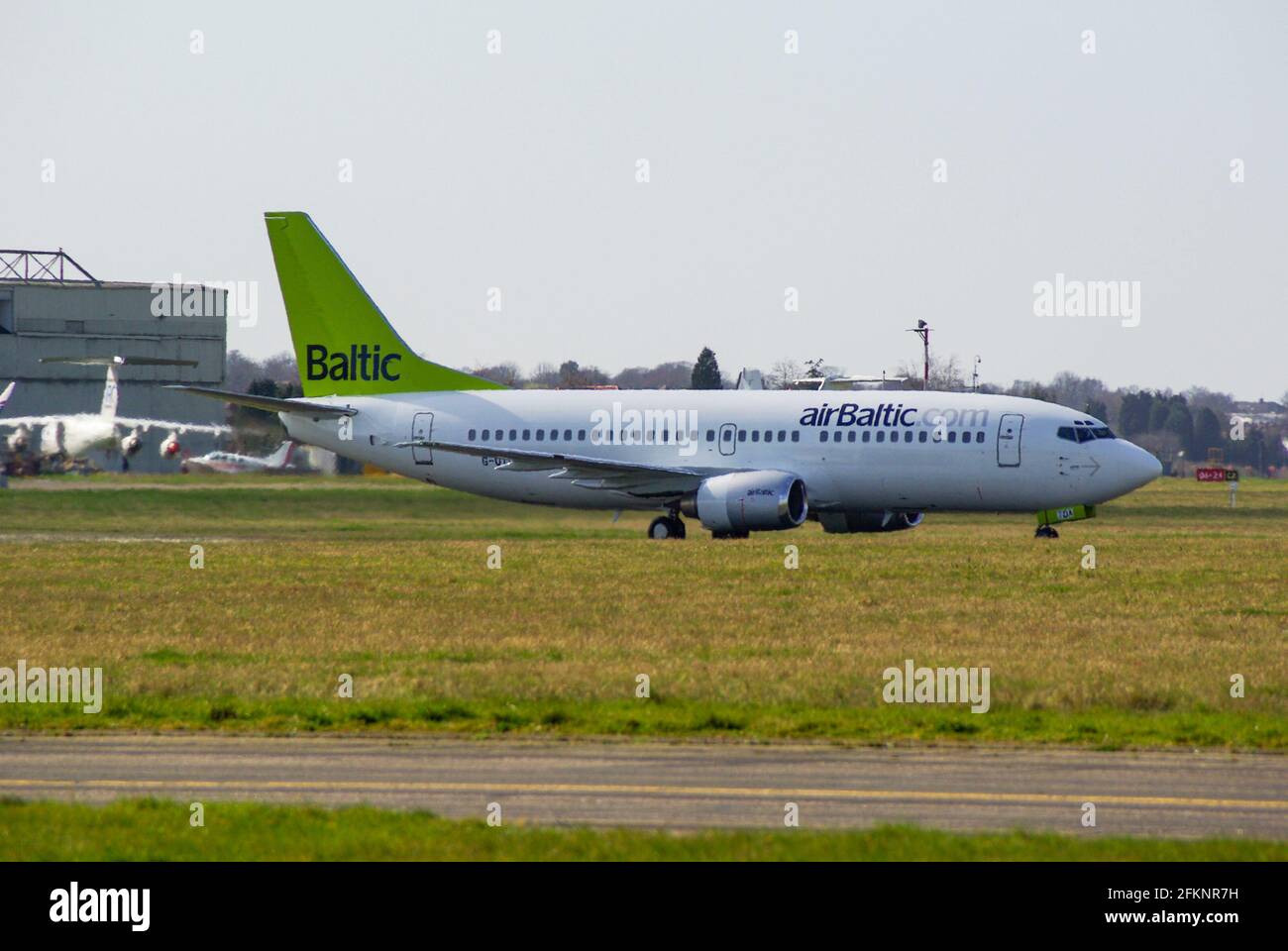 Boeing 737 carrying out engine runs after preparation and paint for delivery to AirBaltic. Formerly G-OTDA with Flyglobespan. To become YL-BBR Stock Photo