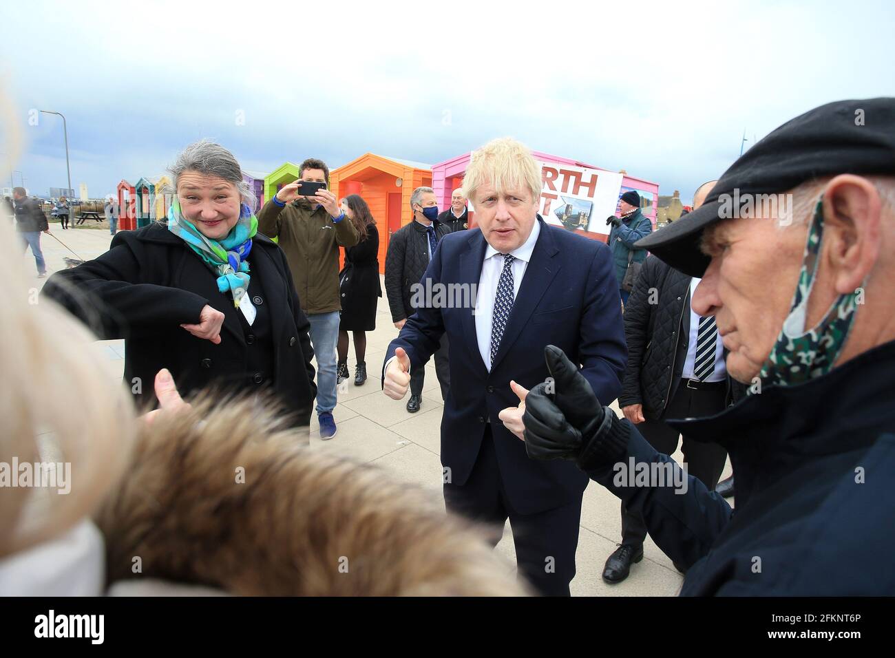 Prime Minister Boris Johnson (centre) greets members of the public as he campaigns on behalf of Conservative Party candidate Jill Mortimer (left) in Hartlepool, in the north-east of England ahead of the 2021 Hartlepool by-election to be held on May 6. Picture date: Monday May 3, 2021. Stock Photo